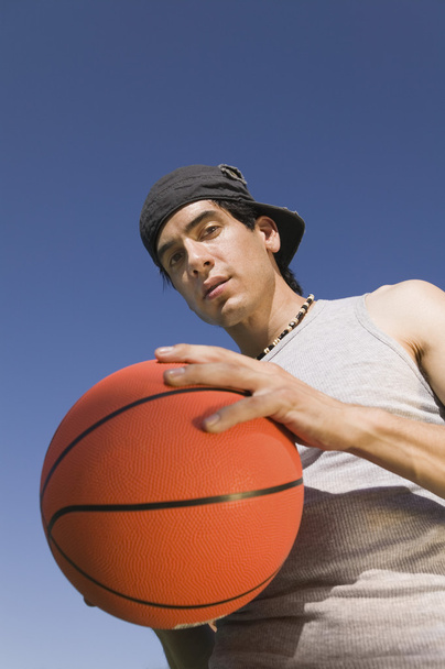 Man Holding Basketball - Фото, изображение