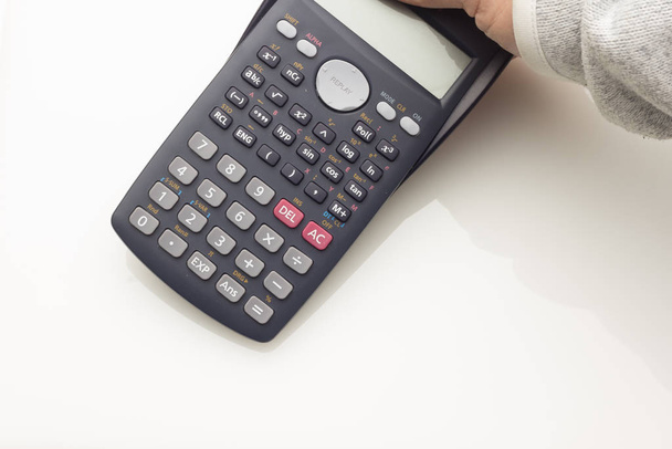 Financiële calculator om complexe berekeningen te maken - Foto, afbeelding