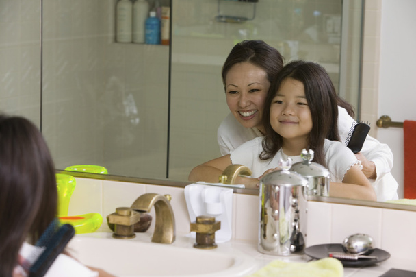 Mother and Daughter in Bathroom - Photo, Image
