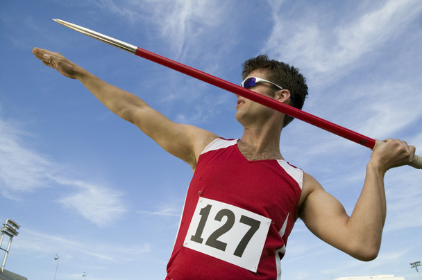 Athlete about to throw javelin - Foto, afbeelding