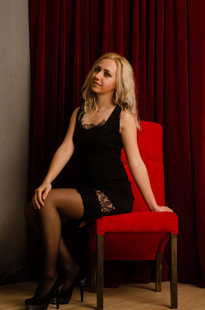 Cute blonde woman in beautiful dress - Valokuva, kuva