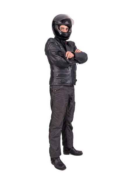 Biker in leather jacket with helmet isolated in white - Фото, зображення