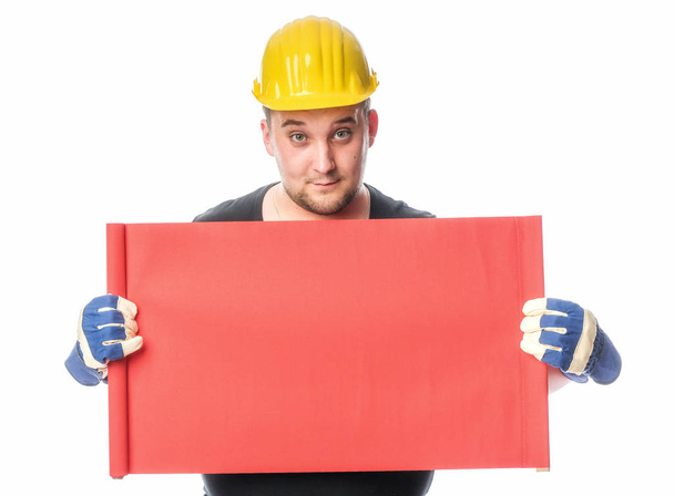 craftsman holding an advertising sign - Foto, imagen