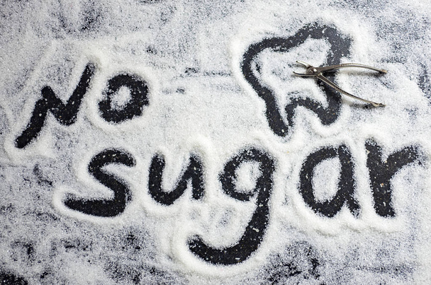 the inscription of no sugar, caries prevention, dental health care, causes of carious lesions, diabetes, obesity - Foto, Imagen