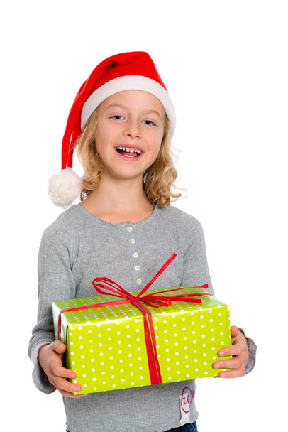 nice girl with Santa- cap and present - Photo, Image