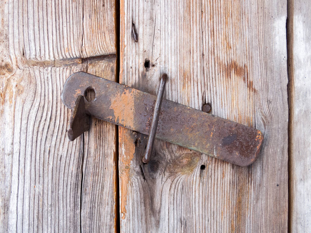 the old-fashioned latch on the door, the old castle, retro style - Photo, image