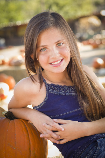 Preteen Girl Portrait at the Pumpkin Patch - Photo, Image