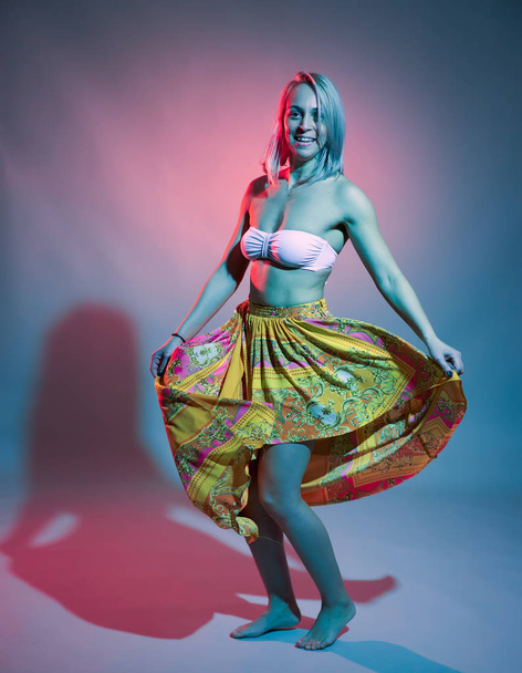 Beautiful blonde dancer in bellydance costume, studio shot - Fotografie, Obrázek