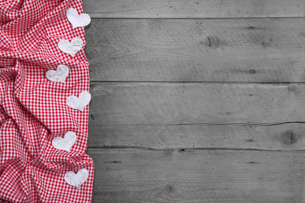 Red and white checkered frame with hearts - Foto, afbeelding