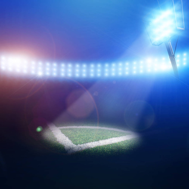 Corner of football field with green grass and stadium light stand - Photo, Image