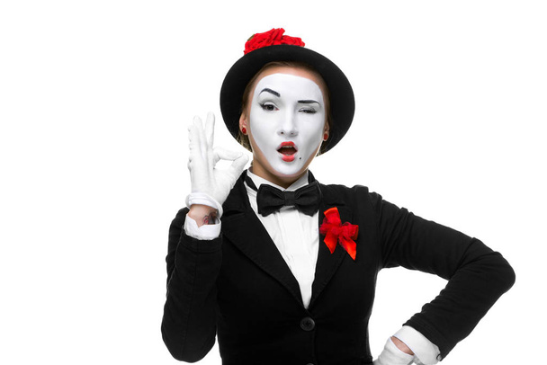 Portrait of the approving woman as mime showing that everything is fine, isolated on white background. - Фото, зображення