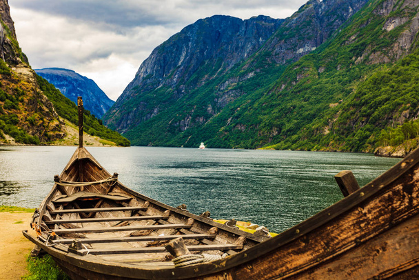 Old viking boat on fjord shore, Norway - Foto, immagini