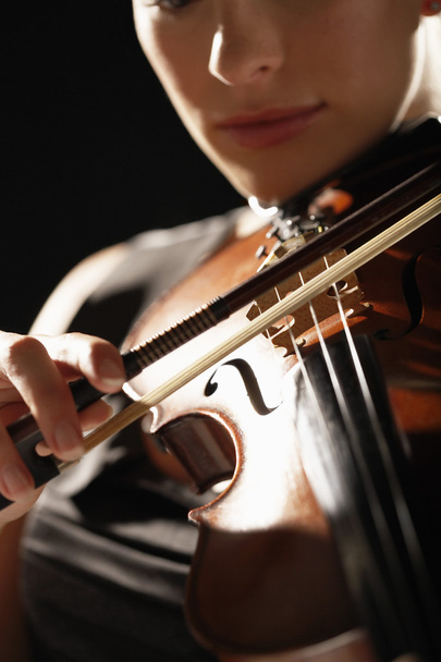 Woman Playing Violin - 写真・画像