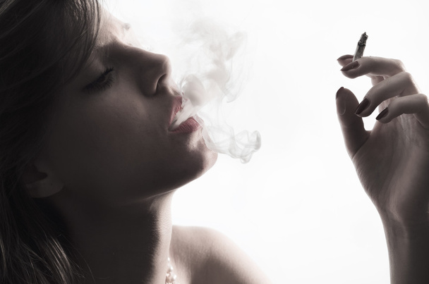 Woman with Cigarette - Фото, зображення