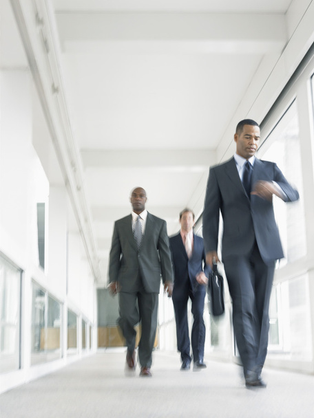 Businessmen walking down - Фото, зображення