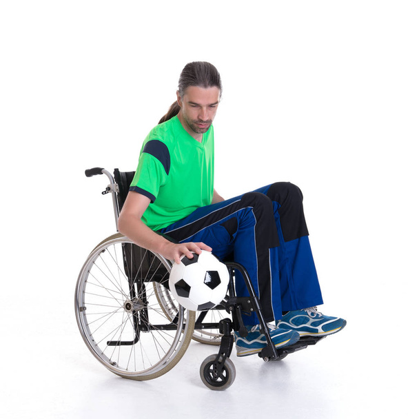 young disabled man in a wheelchair is doing sport with ball - Foto, Imagem