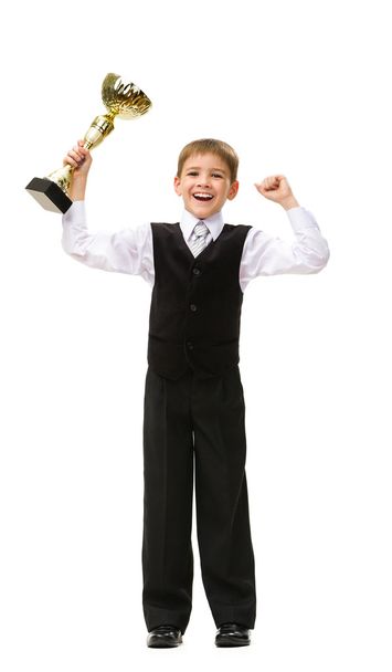 Full-length portrait of little businessman with gold cup - Photo, Image