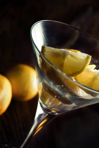 Closeup of lemon slices in martini glass - Foto, imagen