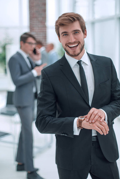 smiling business men standing in the office - Foto, Imagem