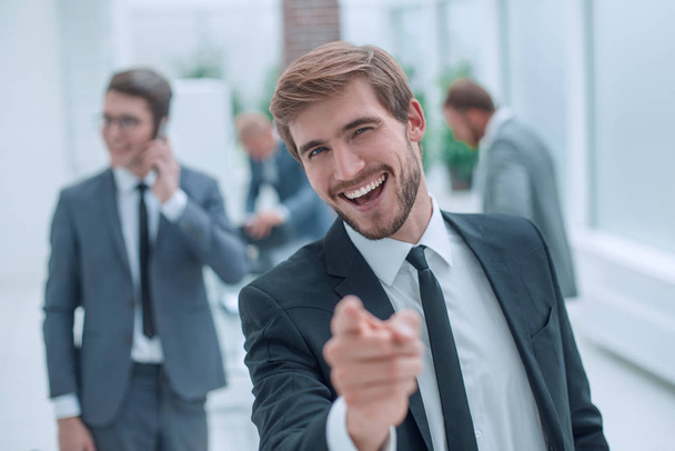 close up. successful young businessman pointing at you. - 写真・画像