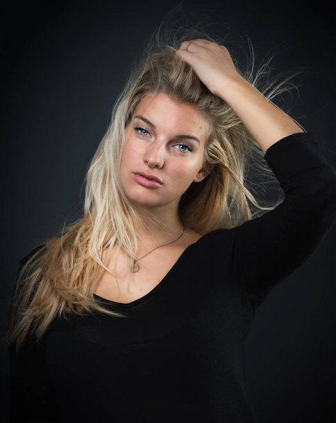 young blond woman with erotic aura - Fotó, kép
