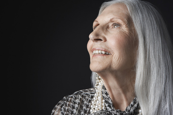 Senior Woman looking up - Photo, image