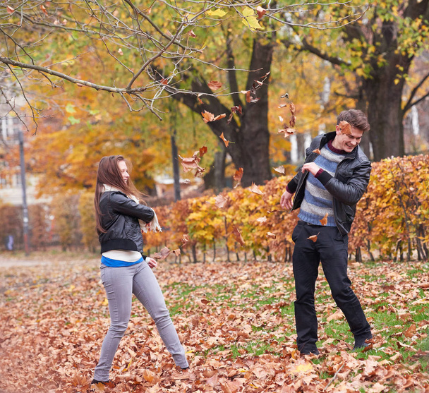romantic young couple have fun in city park at autumn season - Foto, Imagem