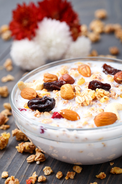 Healthy muesli breakfast with nuts and raisin - Фото, зображення