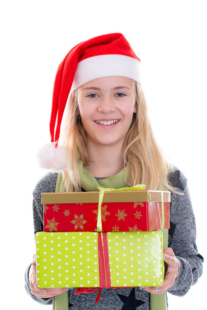 smiling girl with Santa- cap and present - Photo, image