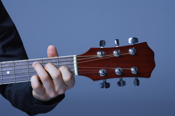 Hand Playing on Neck of Guitar - Foto, imagen