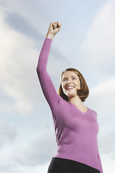 Sorrindo braço mulher levantada
 - Foto, Imagem