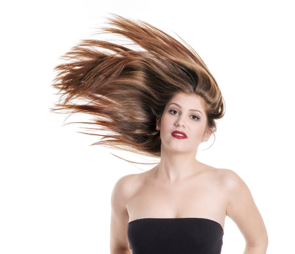 young woman shaking her hair - Foto, Imagem