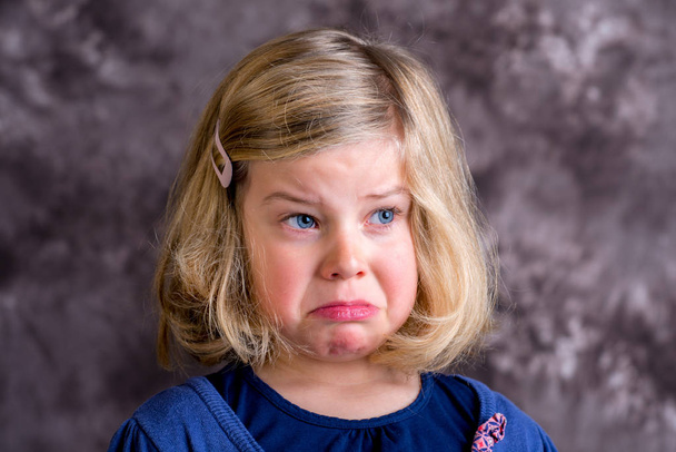 littlegirl is in bad mood and crying - Фото, изображение