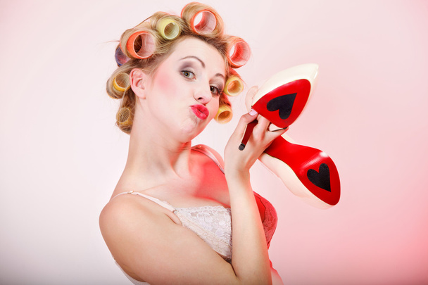 Sexy woman in underwear curlers with shoes - Фото, зображення
