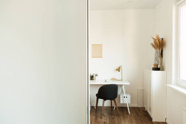 Modern Scandinavian interior design concept. Home office workspace cabinet. White stylish freelancer working room. Bright artist studio. - Fotoğraf, Görsel