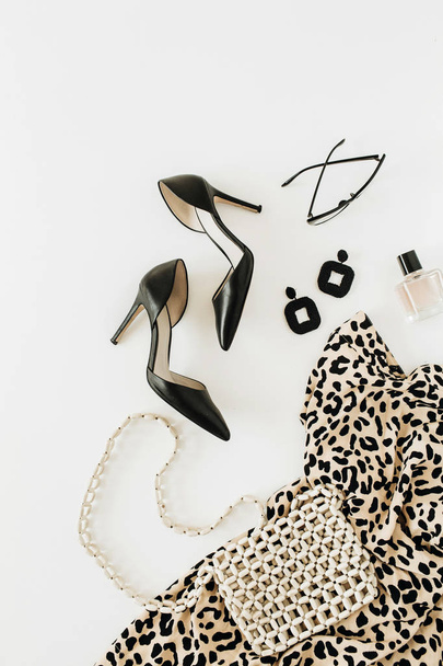 Modern fashion female clothes and accessories on white background. Flatlay, top view. - Fotó, kép
