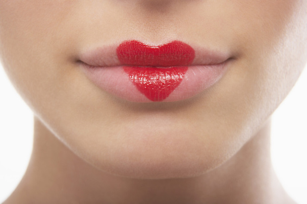 Lips painted with lipstick heart - 写真・画像