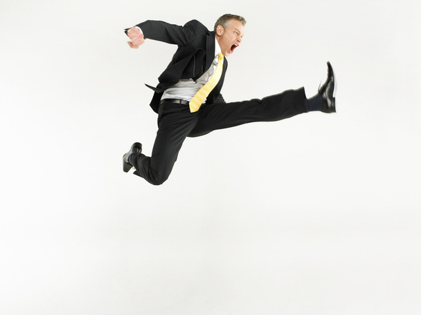 Business man jumping - Foto, Imagen