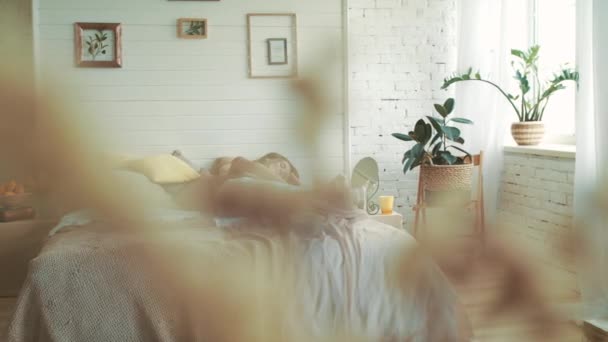Happy pregnant woman getting up in bedroom. Belly mother stroking belly at home. - Filmagem, Vídeo