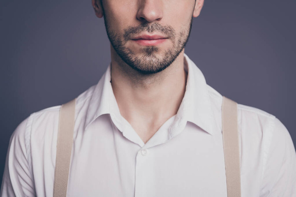 Cropped photo of macho business man charming appearance hiding half face showing perfect beard dressed formalwear white shirt beige suspenders isolated grey color background - Foto, Imagem