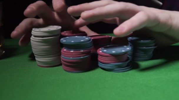Gaming chips on the poker table - Πλάνα, βίντεο
