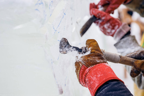 Ice sculpture carving man use chisel cut frozen winter - Photo, Image