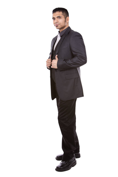young business man wearing suit posing on white background - Foto, Bild