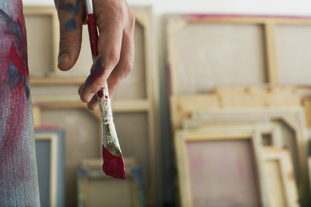 Artist holding paint brush  - Photo, Image