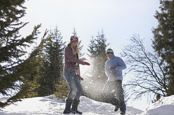 Couple playing in snow - Photo, Image