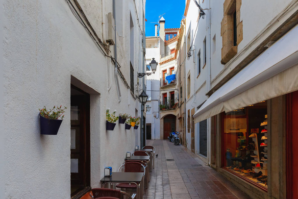 Narrow street of Old Town, Tossa de Mar, Costa Brava, Catalonia, Spain - Photo, Image