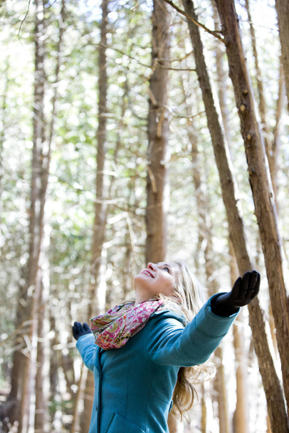 blond casual woman happy outdoors in the woods - Photo, Image