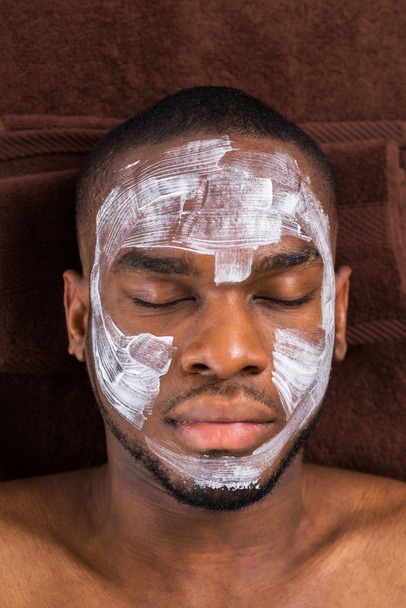 Close-up Of Face Mask Applied To Young Man In Spa - Zdjęcie, obraz