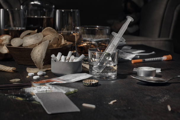 Drugs and alcohol on the table - Photo, Image