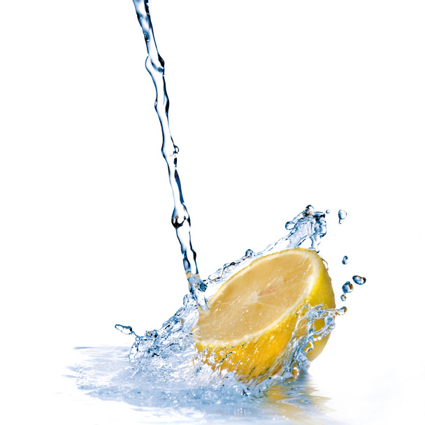 Fresh water drops on lemon isolated on white - 写真・画像